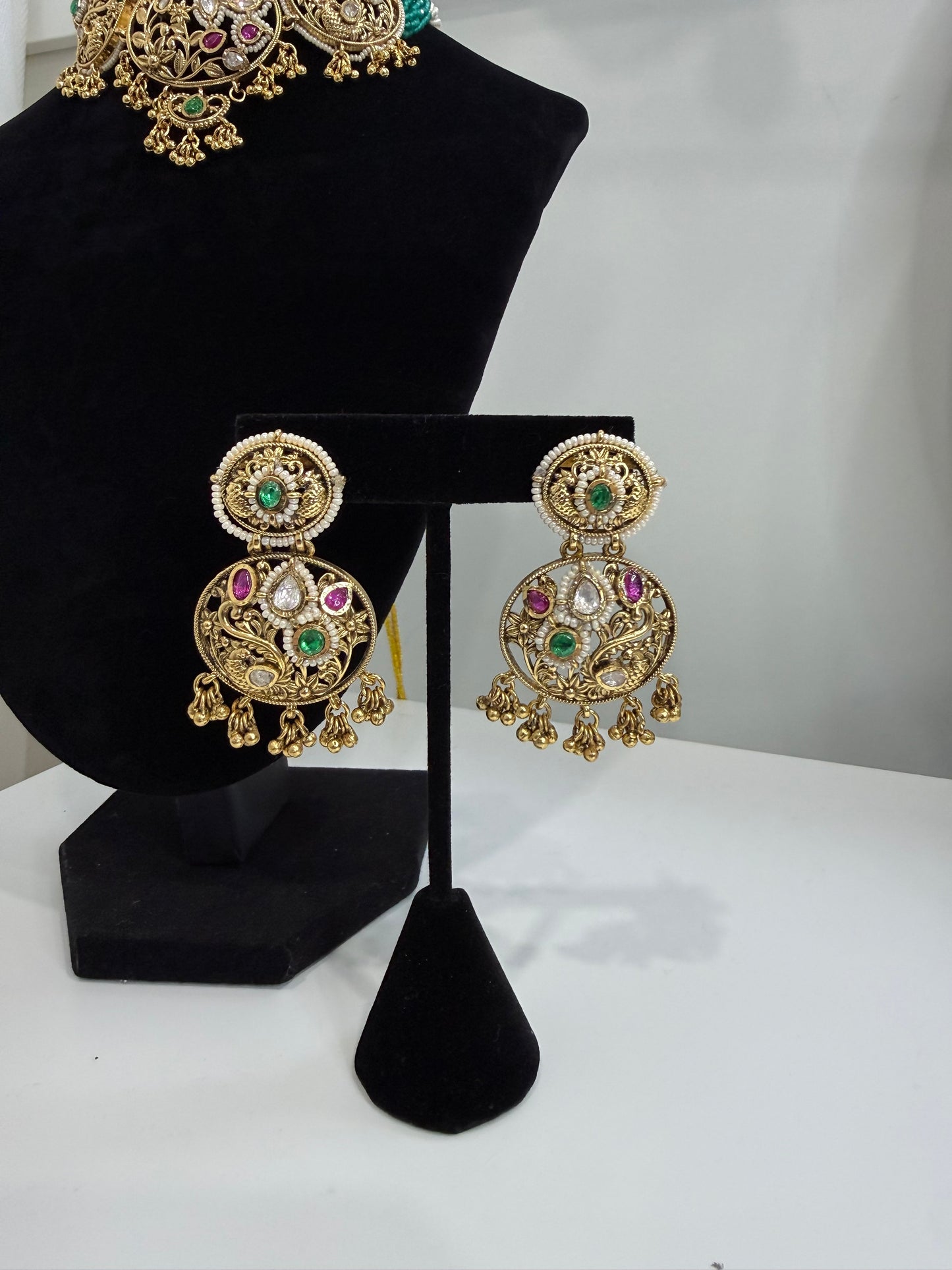 Stunning Gold and Kundan Set with Green and Red Stone Work and Pearls