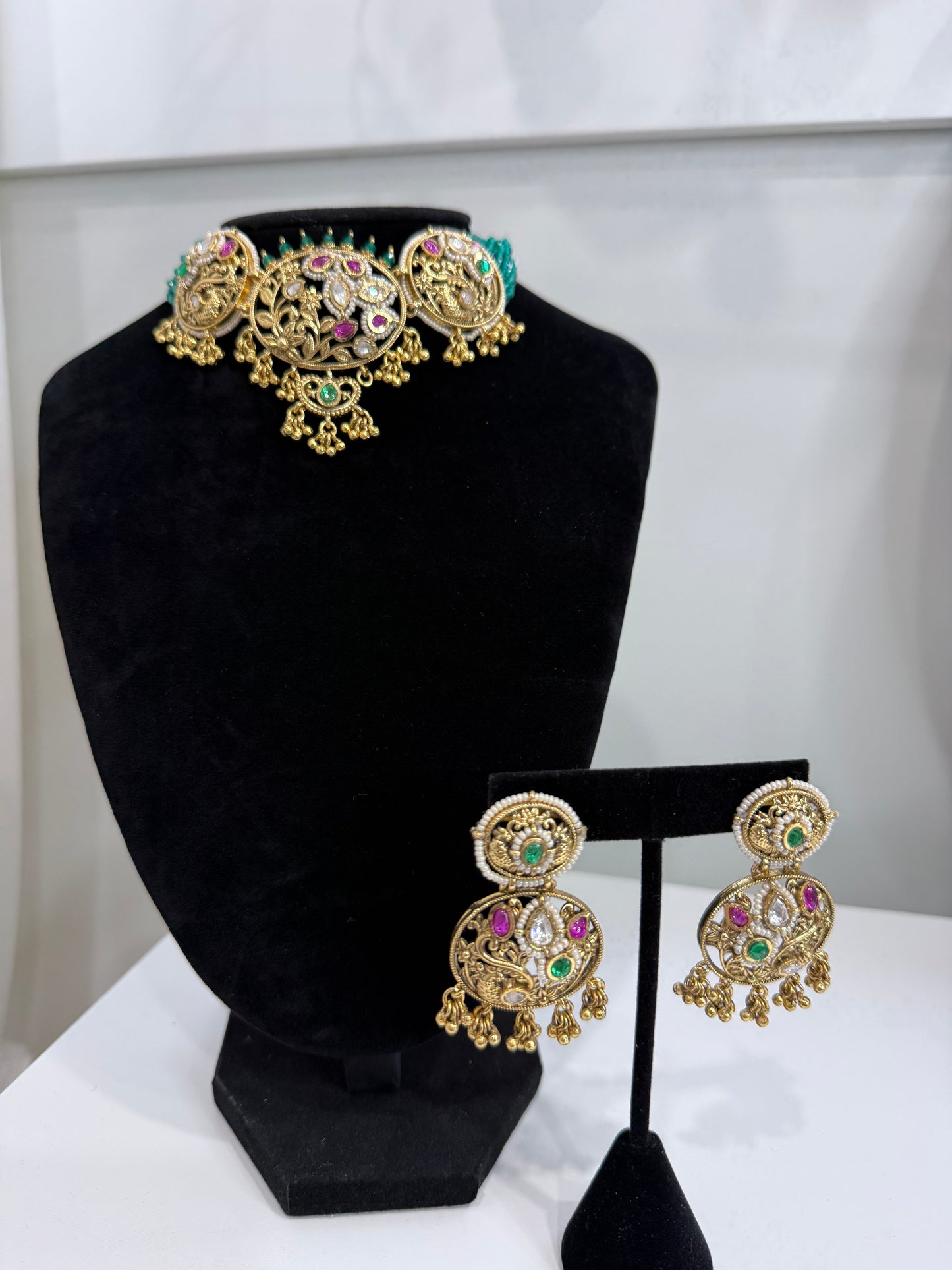 Stunning Gold and Kundan Set with Green and Red Stone Work and Pearls